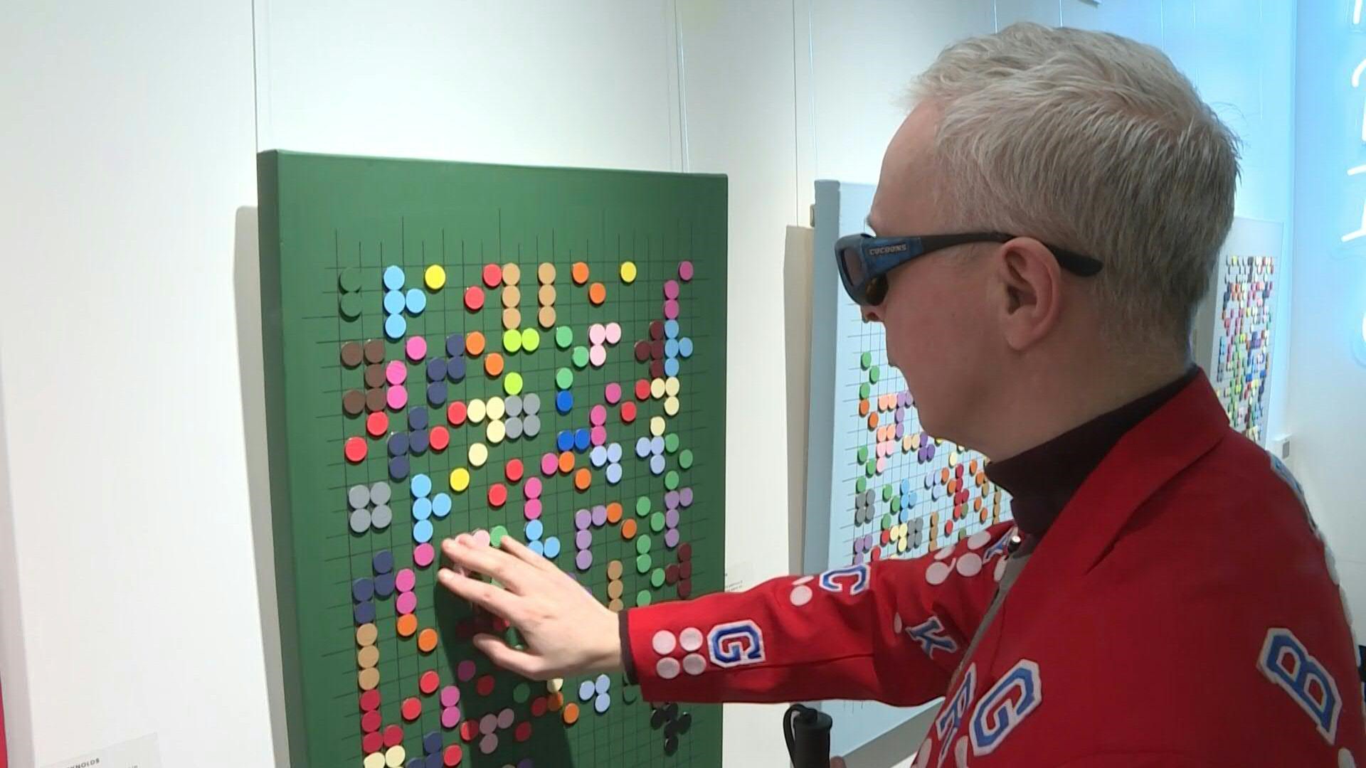 MBtv Visually impaired artist Clarke Reynolds exhibits Braille work in